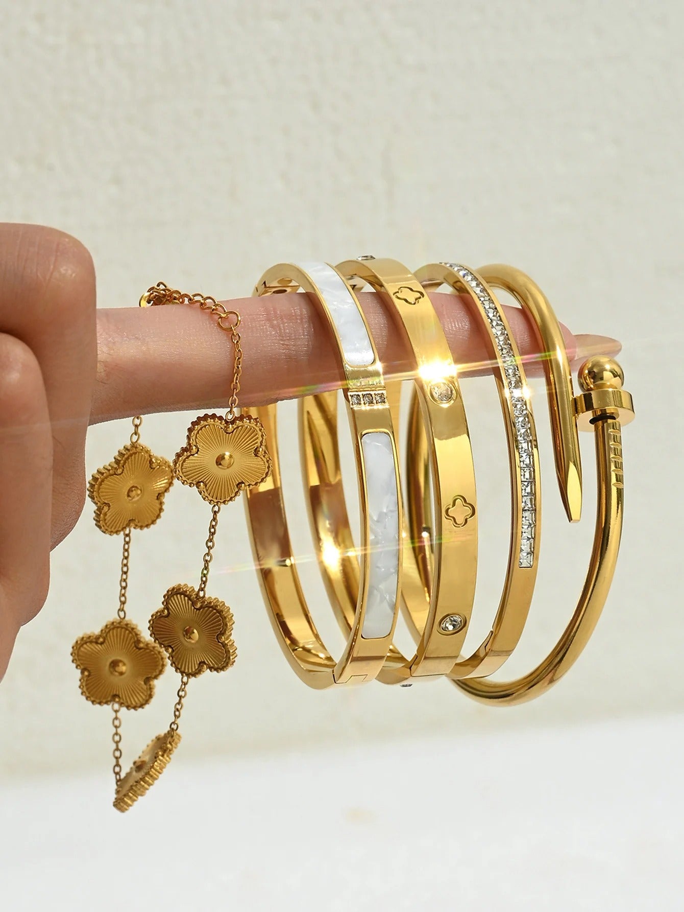 Stainless steel gold diamond set women's four-leaf clover bracelet